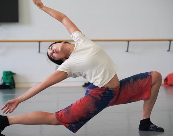 student performing in a dance class